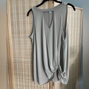 Cute summer top by she & sky. Very drapey. Gathered at one side of waist.